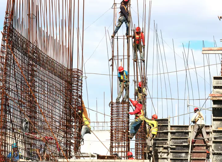 Reinforcement work coordinated on an active construction site.
